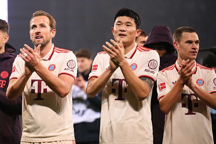 Harry Kane e Kim Min-jae comemoram a vitória do Bayern sobre o St Paul